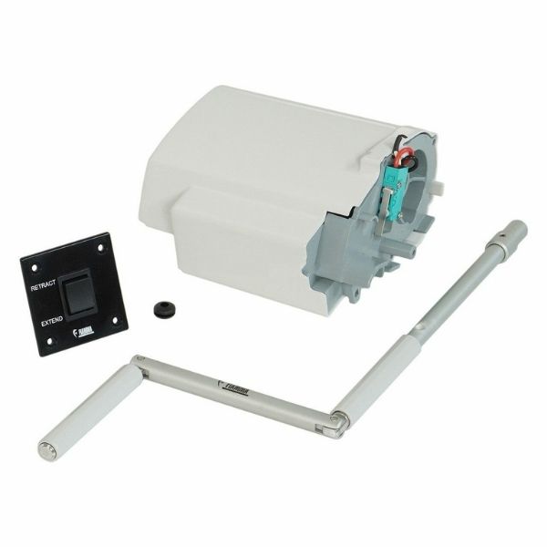 Product components laid out including a motor housing, articulated awning arms, and a wall mounted control switch labeled "RETRACT" and "EXTEND" with "FIAMMA" branding. Image highlights parts used in a motorized setup for a Fiamma F45S vs F80S awning system.